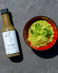 Thai green hot sauce mixed with guacamole